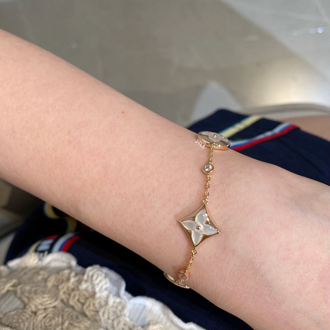 [Vicky]STAR AND SUN 4 MOTIF WHITE MOP PINK GOLD BRACELET