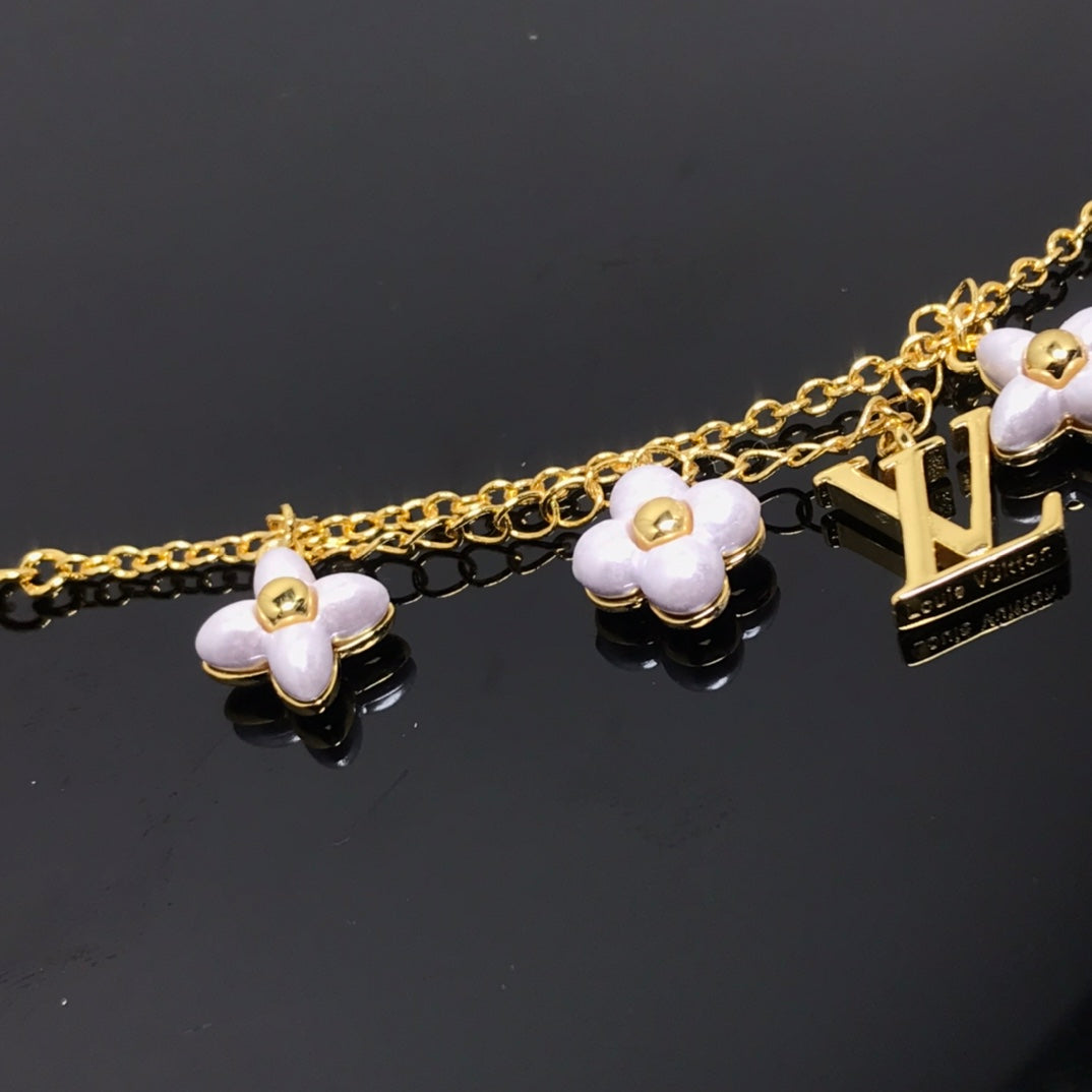 [Vicky]LOGO 6 MOTIF STAR AND SUN GOLD BRACELET